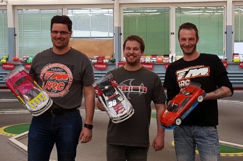 Brulé and Plancherel / Team Magic E4RS III Plus on the podium of the DMTCC Challenge Rd 4 at Court